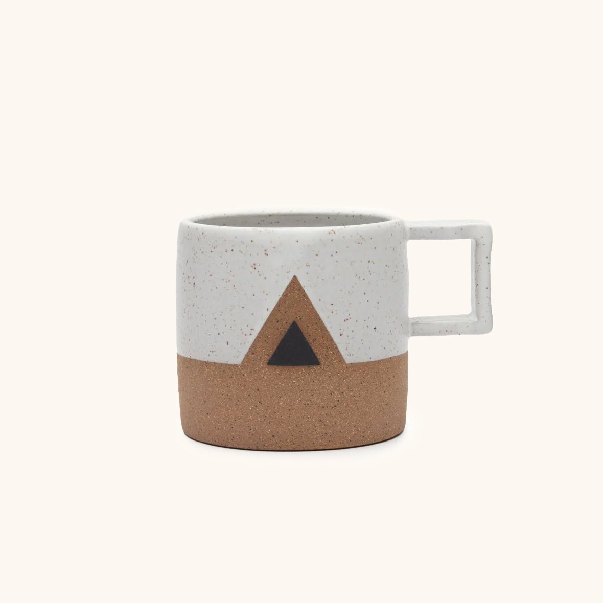 Handle Mug with white satin glaze and a black triangle. Made in Hood River, Oregon by Wolf Ceramics.