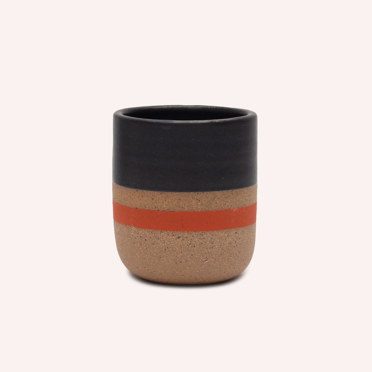 Handleless Mug with black satin glaze and reddish/orange stripe. Made in Hood River, Oregon by Wolf Ceramics.