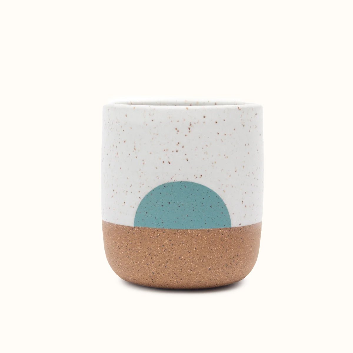 Speckled stoneware handless mug with white satin glaze collar and teal concentric design. Designed and hand thrown by Wolf Ceramics in Hood River, OR.