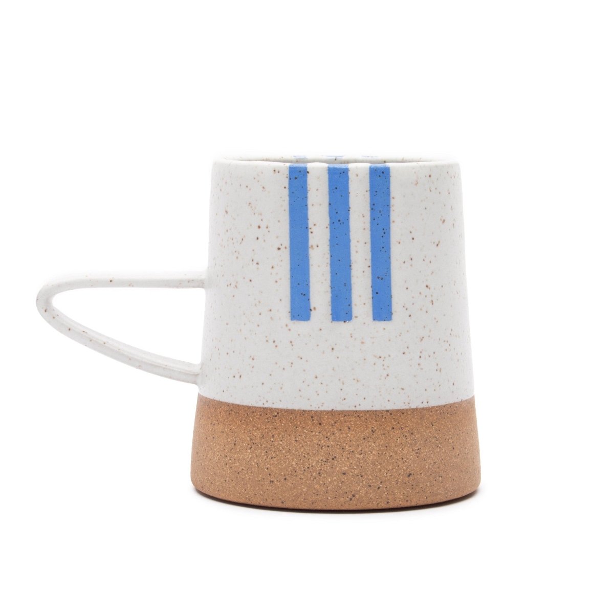 Handle mug with a white speckled and natural clay finish along with blue detailing. The Tucker Mug with Red Detail is designed and handmade by Wolf Ceramics in Hood River, Oregon.