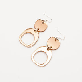 Inverted Ovoid Mini Earrings in Rose. Mirror acrylic and sterling silver. Made in Canada by Warren Steven Scott.