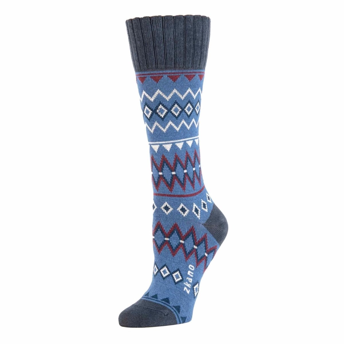 Sky blue sock with white, red and navy blue criss-cross pattern. Heel, toe and ribbed collar are a dark blue. The Winter Faire Isle Sock in Cornflower is from Zkano and made in Alabama, USA.