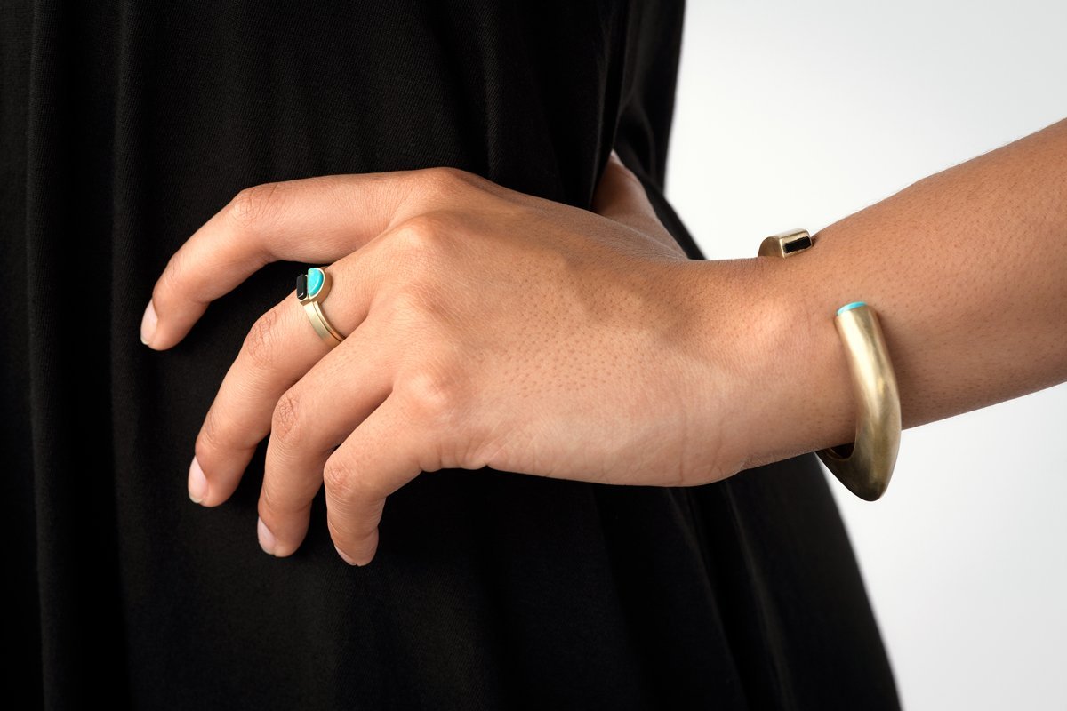 Bronze Cima cuff on model's wrist
