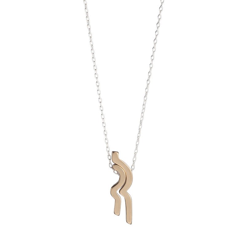 Two small, bronze bars, with complementary curves that fit into one another, threaded with a delicate, sterling silver chain. Hand-crafted in Portland, Oregon.