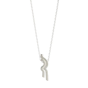 Two small, sterling silver bars, with complementary curves that fit into one another, threaded with a delicate, sterling silver chain. Hand-crafted in Portland, Oregon.