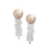 Lightweight, bronze, domed studs with wavy sterling silver fringe. Hand-crafted in Portland, Oregon. 