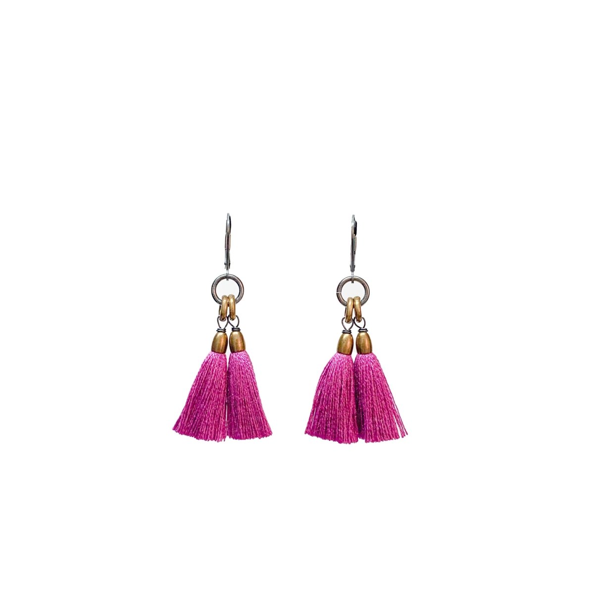 A pair of dangling earrings with fuchsia tassels and brass rings topped with a silver leverback. The Fan Earrings in Hot Violet are from Portland designer Emily Bixler of BOET.