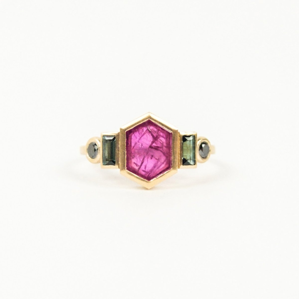 top of hexagonal ruby ring with tourmaline and black diamond accents