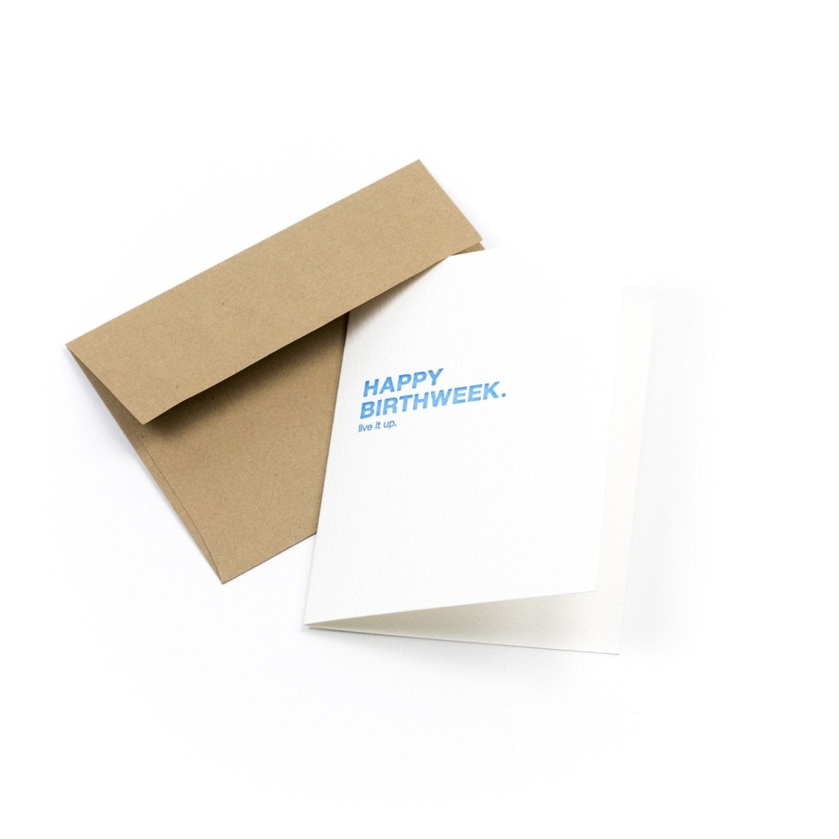 White card that reads: "HAPPY BIRTHWEEK. LIVE IT UP." Written in blue text. Comes with a Kraft envelope. Designed by Sapling Press and printed in Pittsburgh, PA.