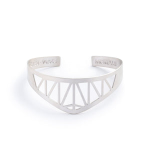 Modern, delicate, and adjustable silver-plated cuff bracelet modeled after the Hernando de Soto Bridge in Memphis, Tennessee, with the bridge's georgraphical coordinates and date of construction engraved on the inner cuff.  Hand-crafted in Portland, Oregon.