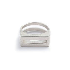 Solid, chunky, cast-silver ring with a flat top and rectangular cutouts on the band and the top of the ring. Hand-crafted in Portland, Oregon. 