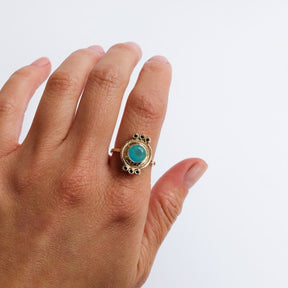one of a kind Peruvian Opal and black diamond gold ring by Portland jeweler betsy & iya on hand