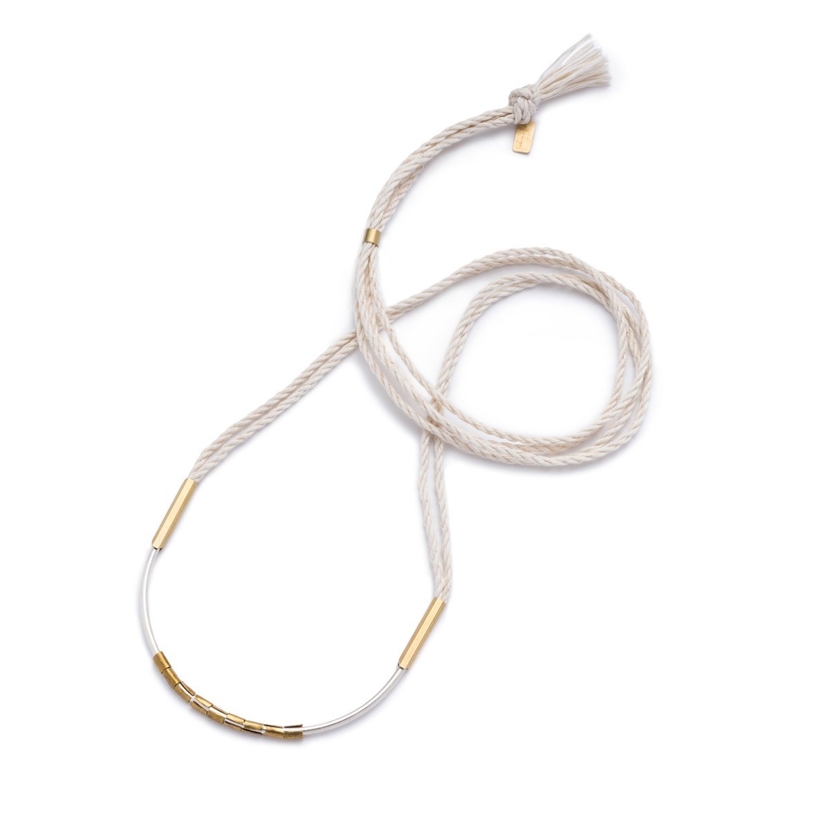Lightweight, textural statement necklace, featuring cream-colored, hand-spun Japanese cotton rope, a curved, sterling silver focal point, African brass trade beads, and brass fittings. Hand-formed in Portland, Oregon. 