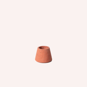 Terrazzo concrete matchstick holder in the shade coral. Made by Pretti.Cool in Houston, Texas.