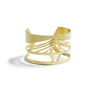 Bold, modern, and adjustable brass cuff bracelet modeled after the Ravenel Bridge in South Carolina, with the bridge's year of construction and geographic coordinates etched on the inner cuff. Hand-crafted in Portland, Oregon.