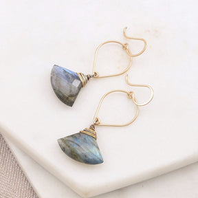 Triangle cut Labradorite earrings with gold-fill ear wire detailing. The Labradorite Shield Earrings are handmade by Amy Olson in Portland, OR.