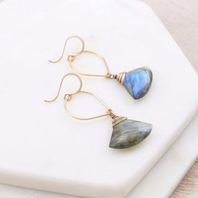 Triangle cut Labradorite earrings with gold-fill ear wire detailing. The Labradorite Shield Earrings are handmade by Amy Olson in Portland, OR.