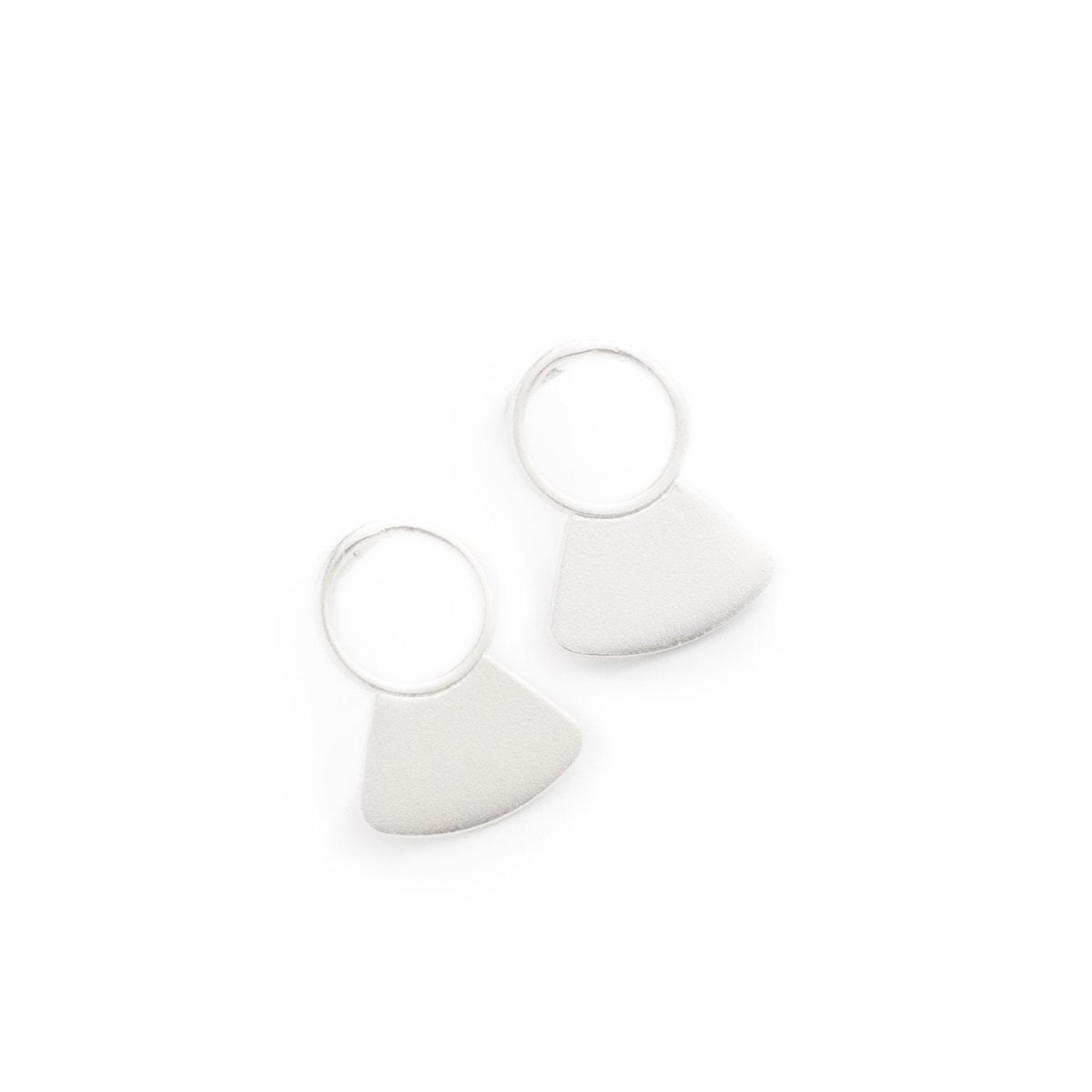 Small, silver-plated studs, featuring a delicate, open circle with a solid fan shape at the base, and sterling silver earring posts. Hand-crafted in Portland, Oregon.