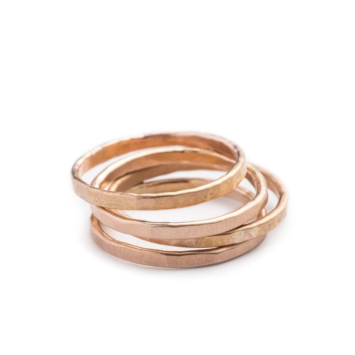 An eye-catching stack of 14k solid gold soldered bands with a hammered texture. Hand-crafted in Portland, Oregon. 