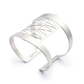 Modern, bold, and adjustable silver-plated cuff bracelet modeled after the Steel Bridge in Portland, Oregon, with the bridge's coordinates and date of construction engraved on the inner cuff.  Hand-crafted in Portland, Oregon.