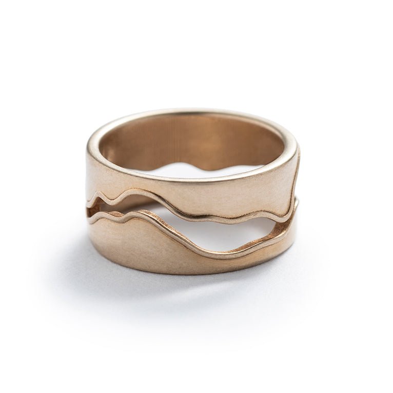 Thick, unisex, cast-bronze band, featuring a curved, wavy cutout modeled after the shape of the Willamette River in Portland, Oregon. Hand-crafted in Portland.